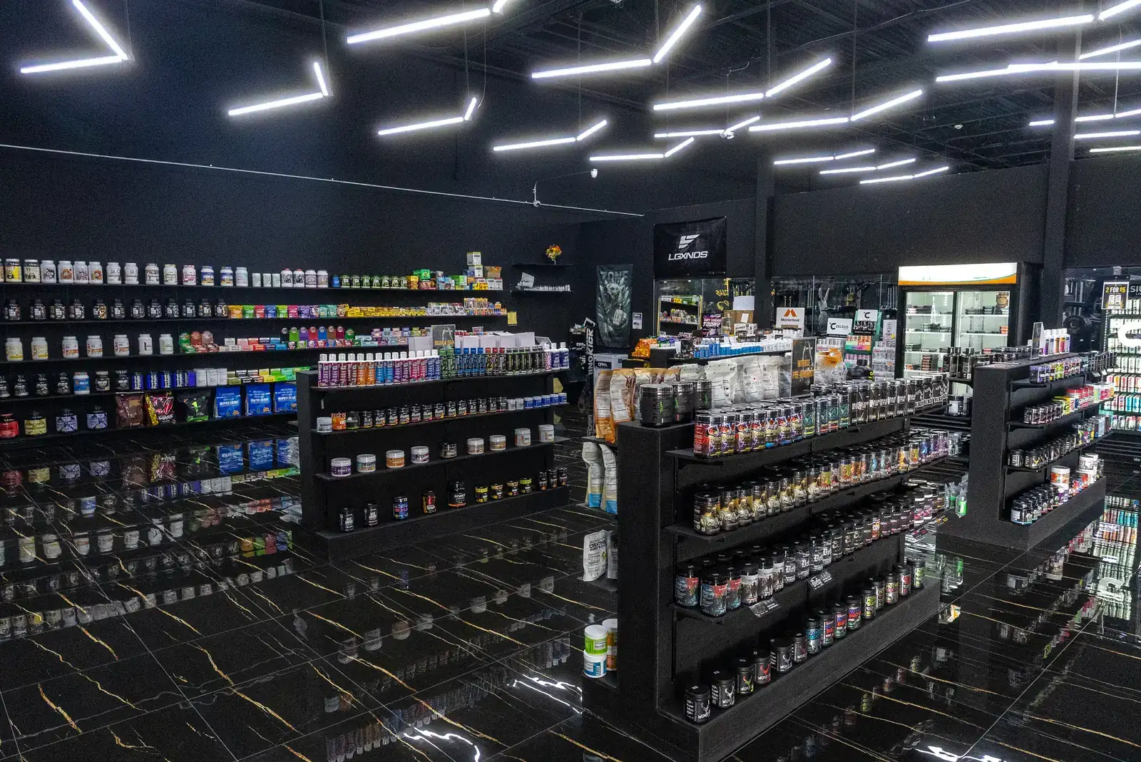 Animal Supps supplement shelves inside Animal Paradise Gyms